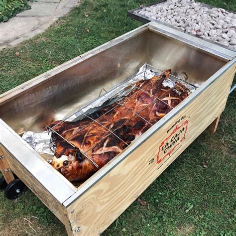 electric chinese box pig roaster|roasting a pig china box.